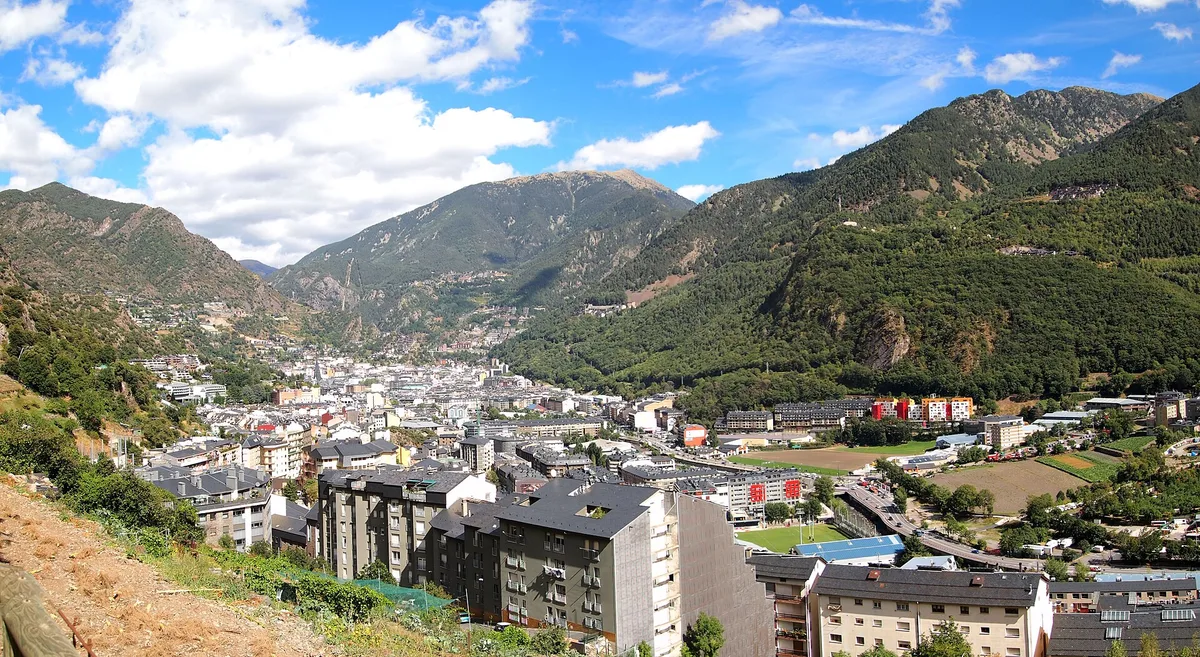 Andorra la Vella buildings and mountain valley viewed from a hillside in Andorra