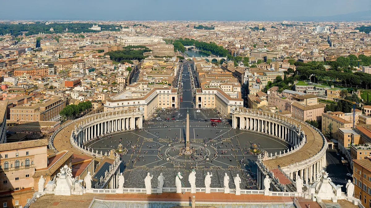 St Peter’s Square viewed from the basilica in Vatican City, with Rome beyond
