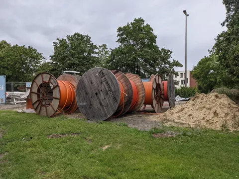 Illustrative equipment reference: "fiber optic" for Italy project planning