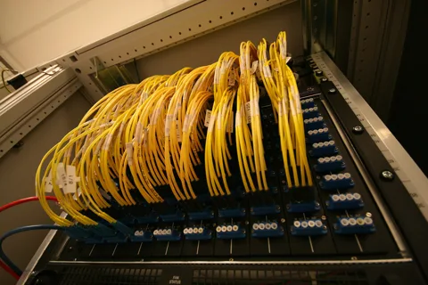 Illustrative equipment reference: "patch panel" for Latvia project planning