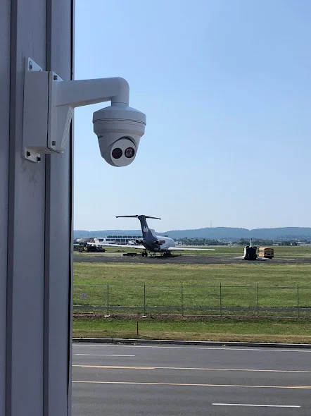 Exterior network camera mounted on a commercial building
