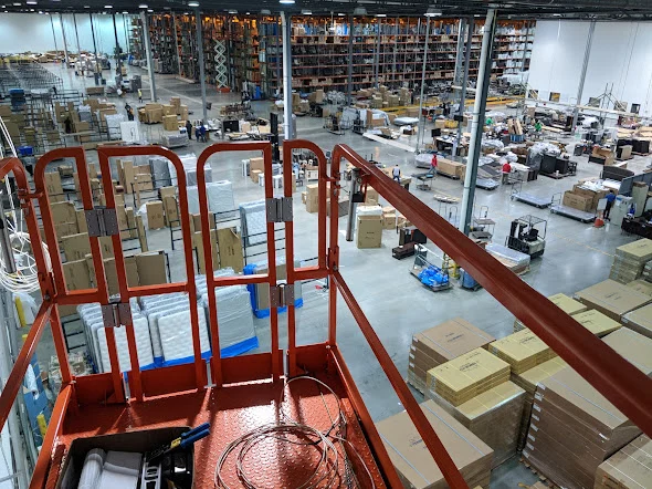 Elevated view over a commercial installation work area