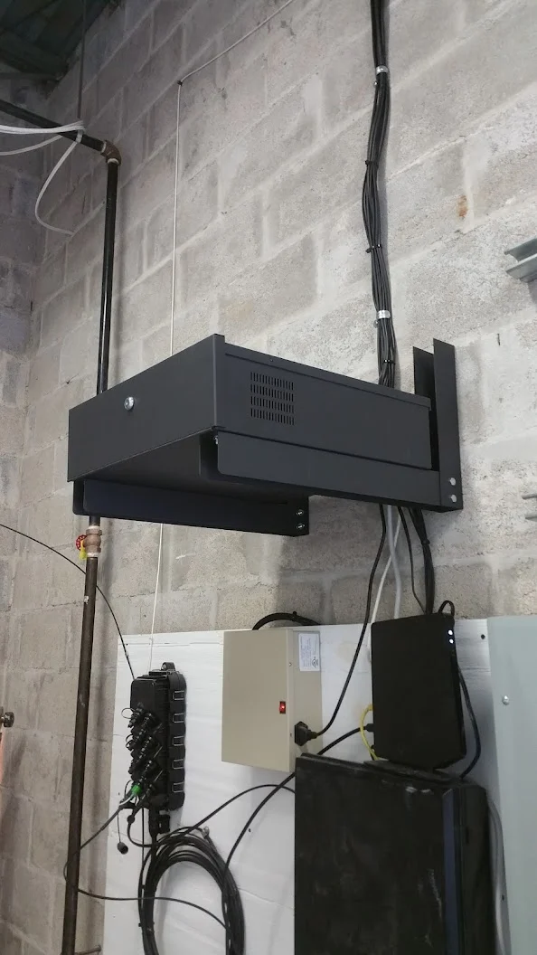Wall-mounted network equipment and connections in a commercial service space